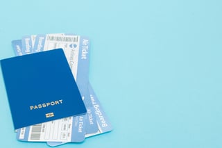 Blue passport with boarding passes Blue passport with boarding passes