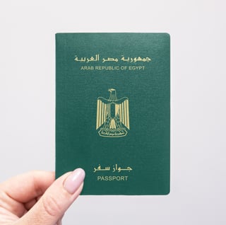 Egyptian passport held in hand Egyptian passport held in hand