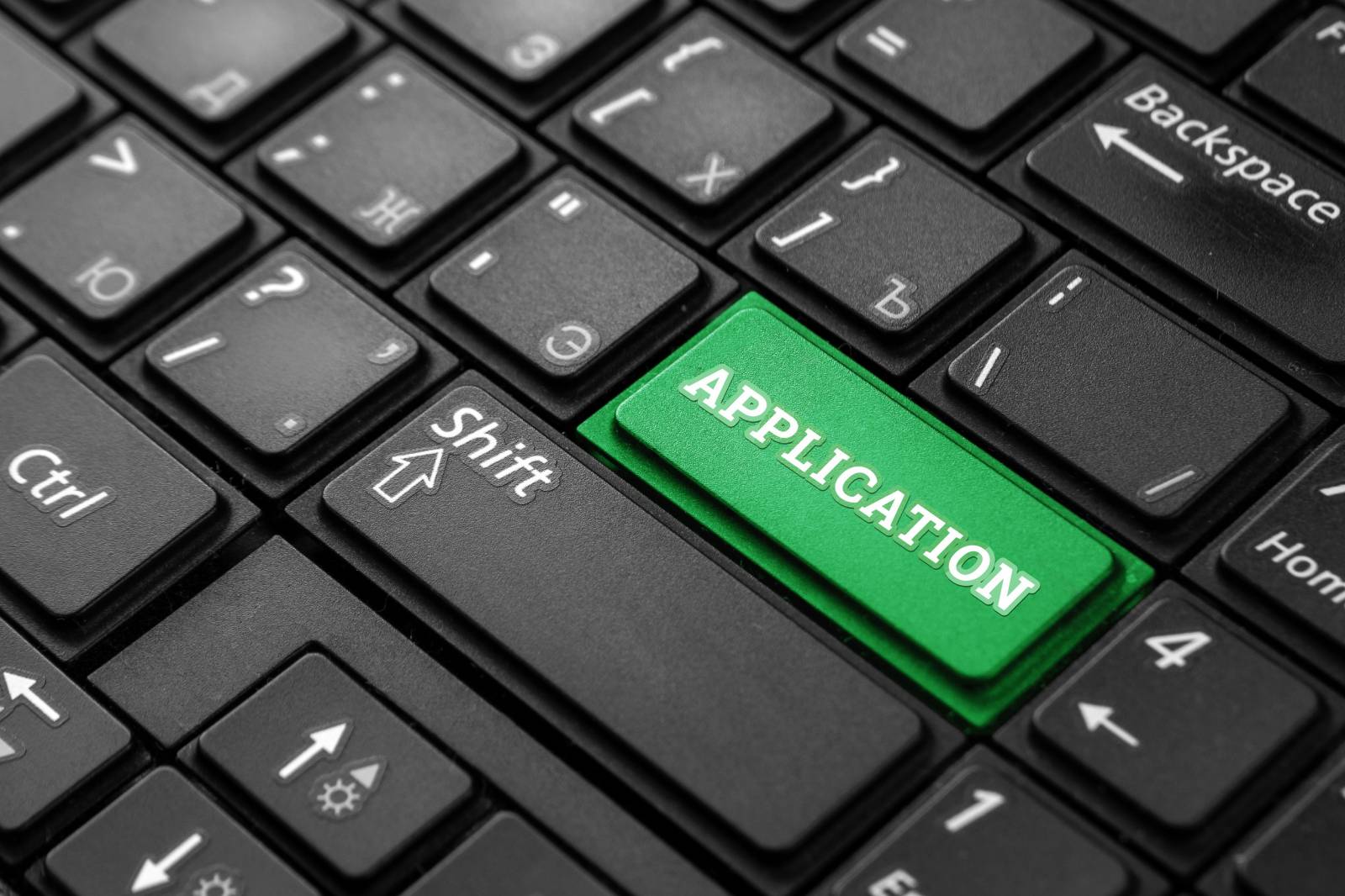 Black keyboard APPLICATION key replacing one of the standard keys Black keyboard with a green APPLICATION key replacing one of the standard keys