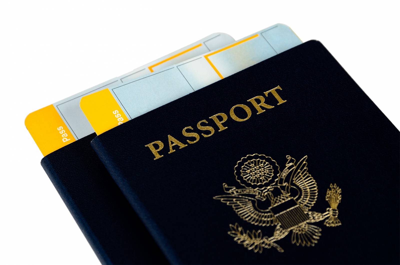 Two U.S. passports with boarding passes partially visible