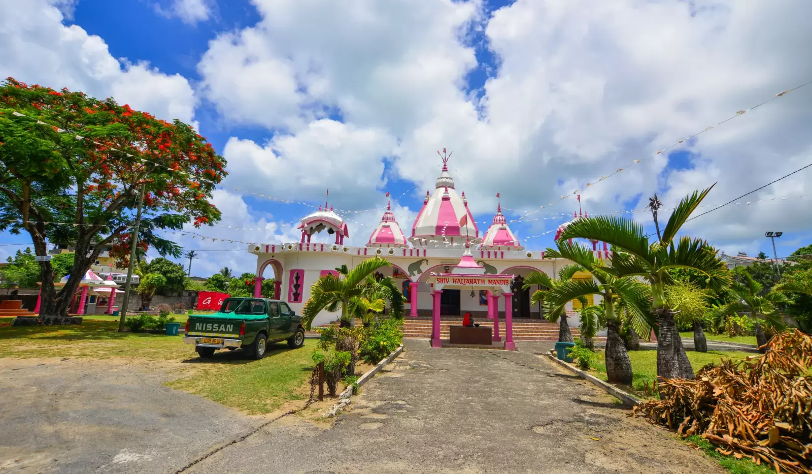 hindu temple with flamboyant tree in port louis mauritius
