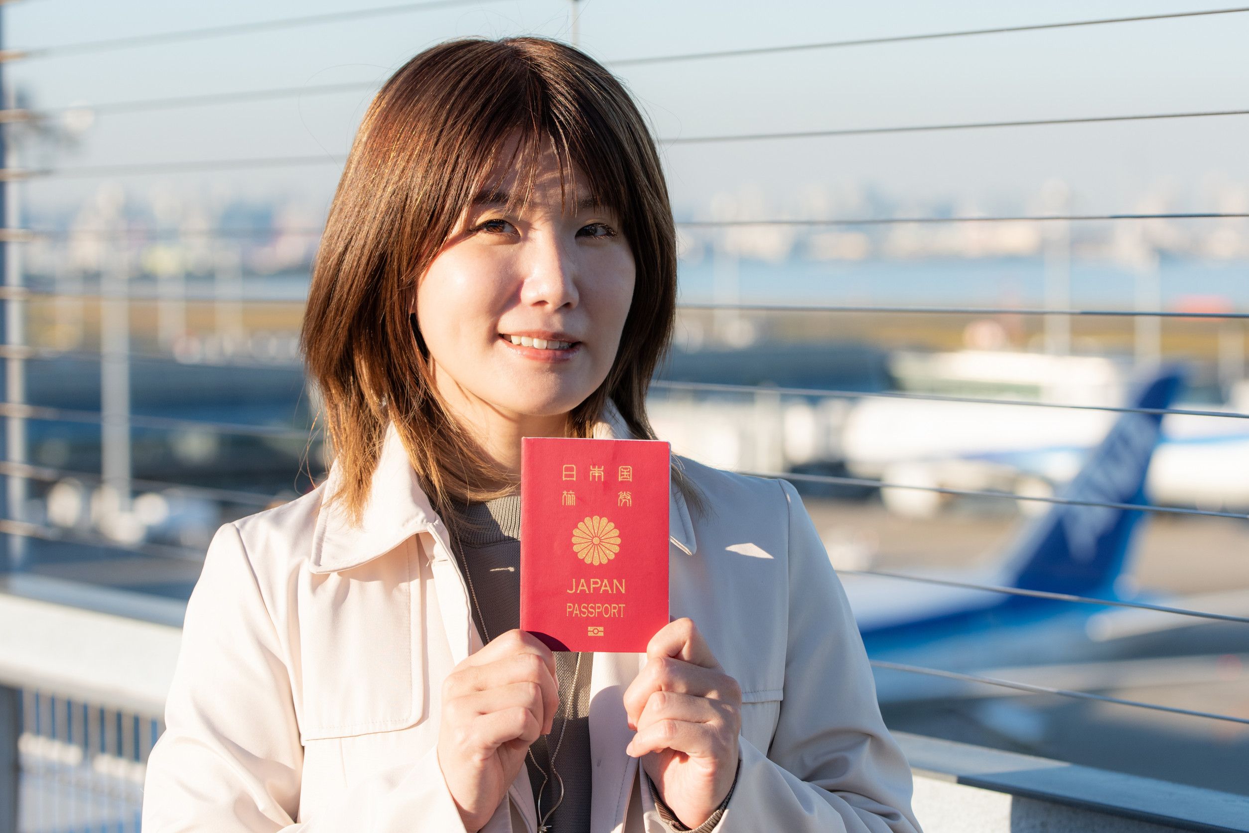 Japan Traveler Woman Holding Passport At Airport