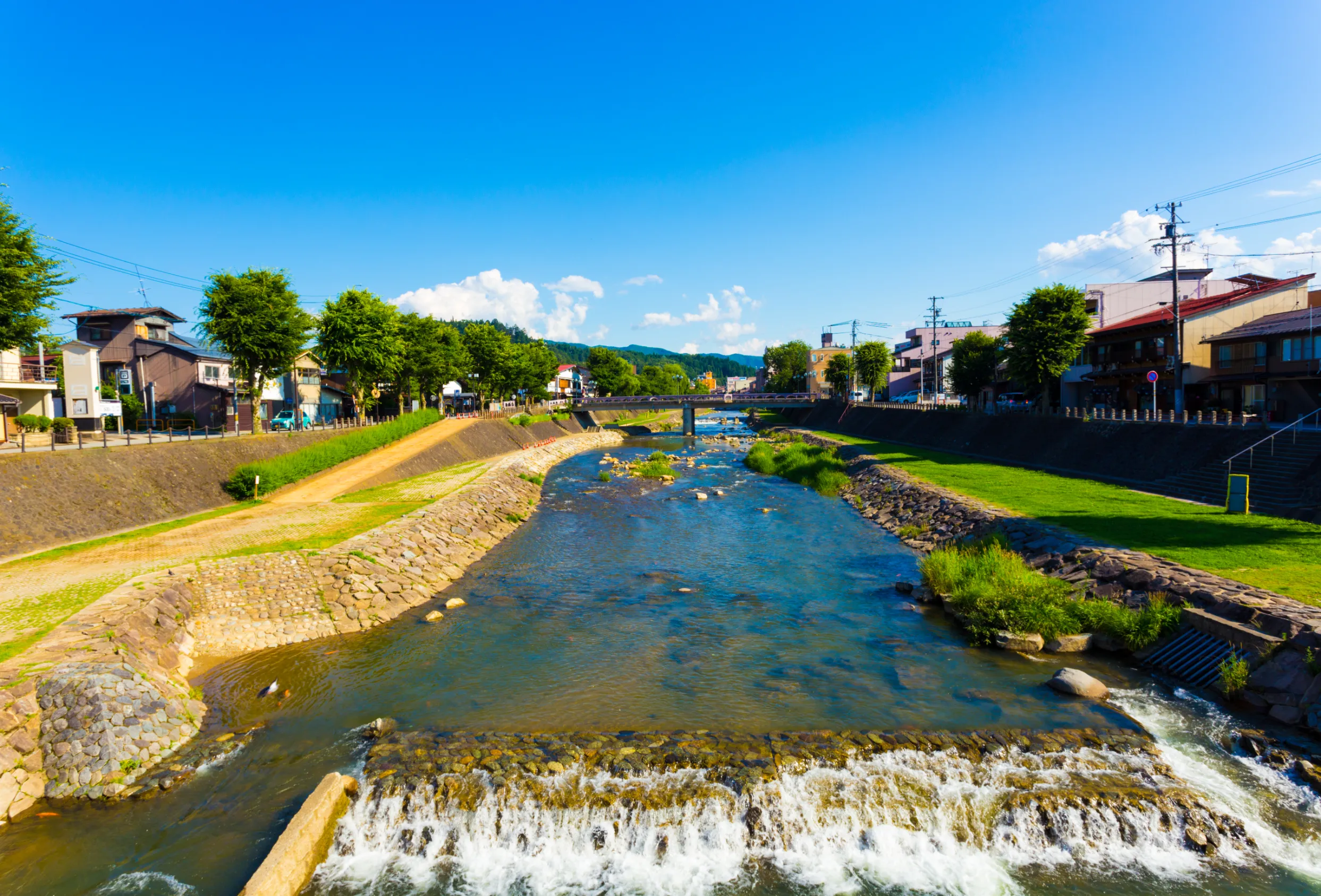 miya gawa river flowing thru the center of takayama a tourist