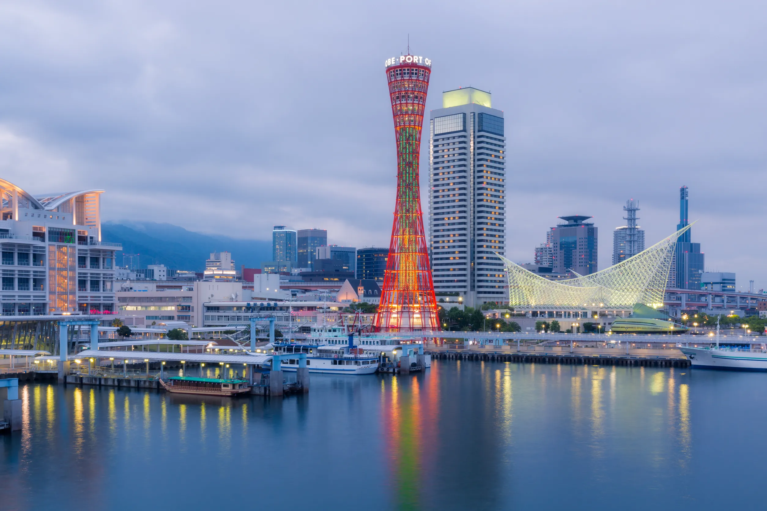 port of kobe tower and skyline in sunset